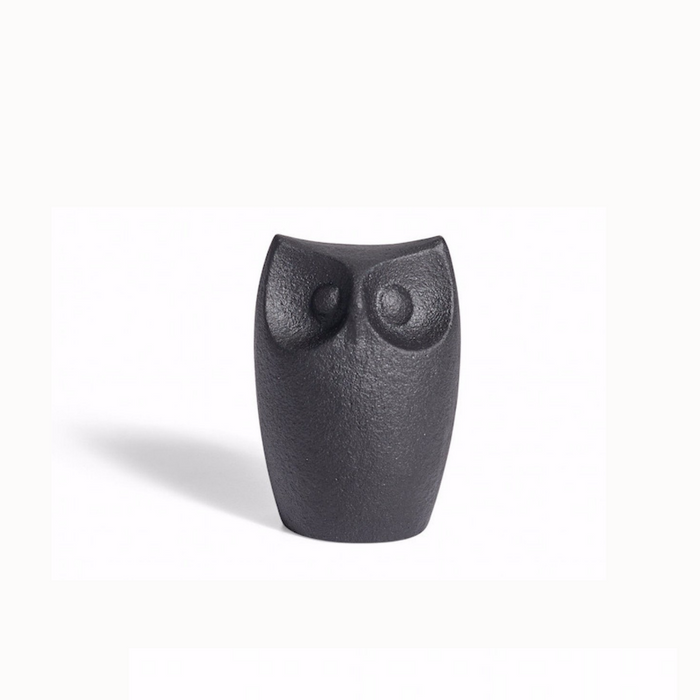 Cast iron horned owl figurine with textured dark finish, rounded body and carved eyes