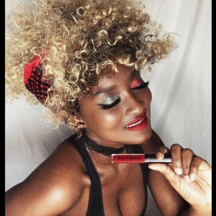 Model Iris wearing red lipstick
