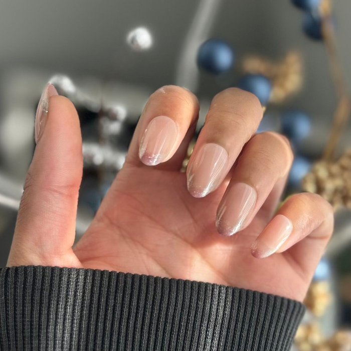 Party Glitter French - Press On | Medium | Oval neutral oval false nails with subtle glitter french tips manicure style