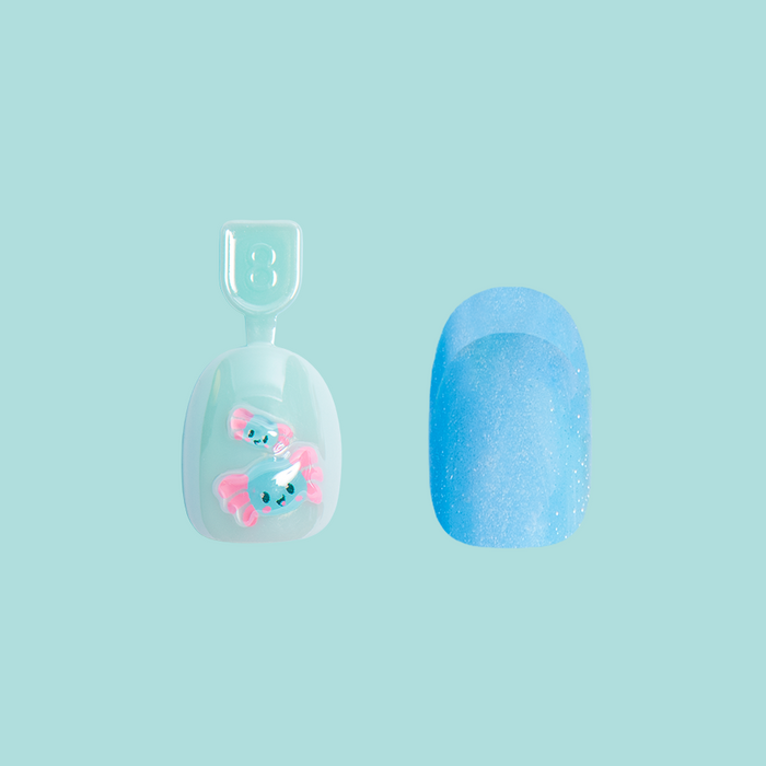Axolotl Set showing two press-on nails with playful blue and pink axolotl designs and glittery blue polish