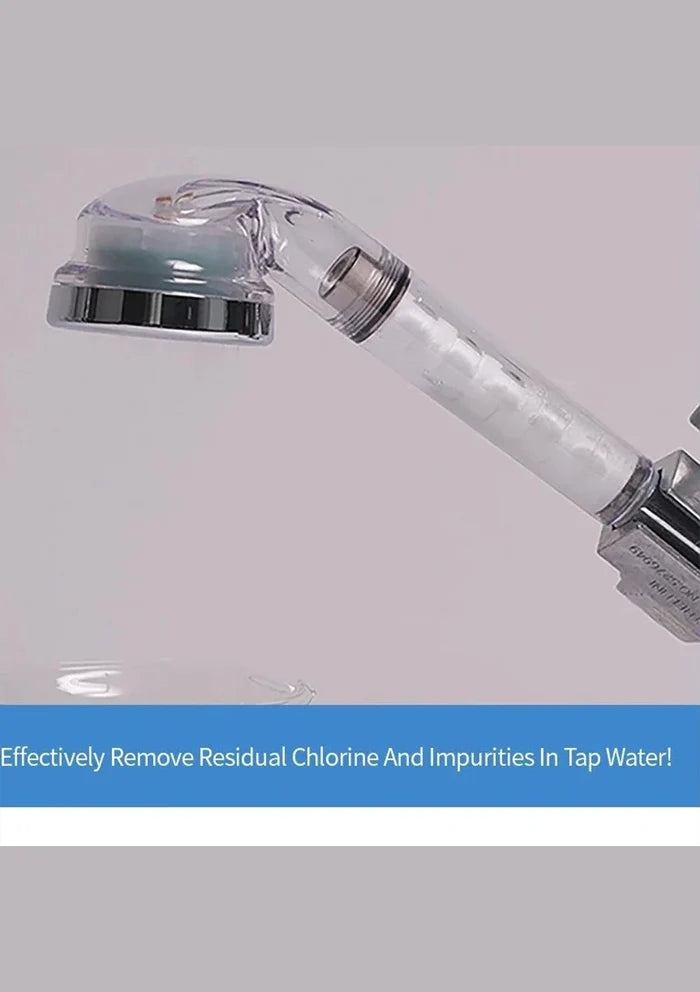 A close-up of a transparent cylindrical water filter cartridge attached to a chrome faucet, with a blue text banner at the bottom claiming chlorine and impurity removal.