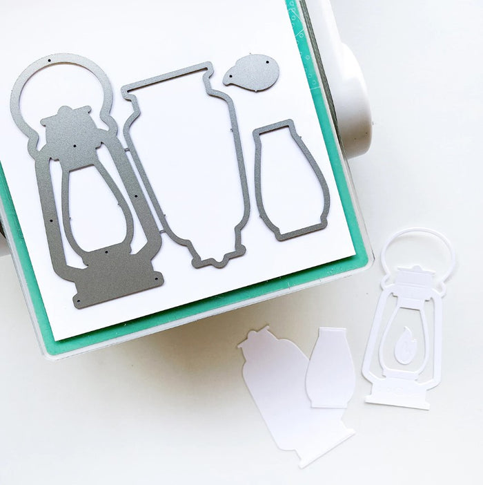 Catherine Pooler - Dies - Camping Lantern. The Summer Nights Collection would be incomplete without a classic Camping Lantern! This die will be great for projects and scrapbook pages as well as light up cards!! Available at Embellish Away located in Bowmanville Ontario Canada.