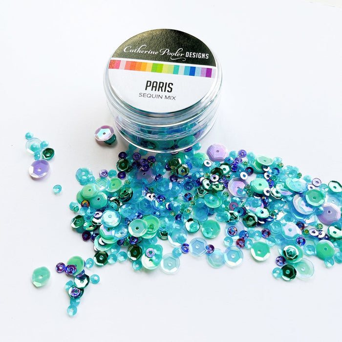 Catherine Pooler - Sequin Mix - Paris. Sitting in a sidewalk cafe alongside the Seine in the spring...sipping coffee and nibbling on sweet macarons.  This is the Parisian dream!  The Paris Sequin Mix is a jar of confection in shades that coordinate with Minted, Oh Boy! and Sixteen Candles Inks. Available at Embellish Away located in Bowmanville Ontario Canada.
