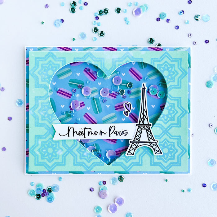 Catherine Pooler - Sequin Mix - Paris. Sitting in a sidewalk cafe alongside the Seine in the spring...sipping coffee and nibbling on sweet macarons.  This is the Parisian dream!  The Paris Sequin Mix is a jar of confection in shades that coordinate with Minted, Oh Boy! and Sixteen Candles Inks. Available at Embellish Away located in Bowmanville Ontario Canada. Shaker card by brand ambassador