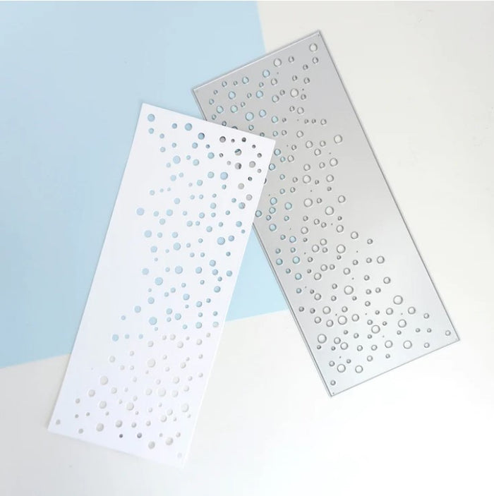 Catherine Pooler - Slimline Die - Flurries. The Flurries Slimline Die was created to add snow to your slimline cards! Keep it simple with a white on white look or ink blend with your favorite icy blues. Available at Embellish Away located in Bowmanville Ontario Canada.