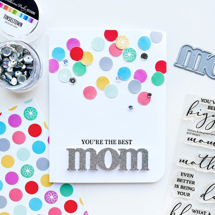 Catherine Pooler - Word Die - Just Mom. Send a card to your favorite mom!  The Just Mom Word Die is a simple block font "mom" that will be a cute addition to any card for mother's day or any day celebrating your best lady! Take the "m" and cut one hump off to create "mum"!  The Mom Word Die measures approx. 3" x 1".  Illustrated by Lisa Kirkbride. Available at Embellish Away located in Bowmanville Ontario Canada. Card by brand ambassador.