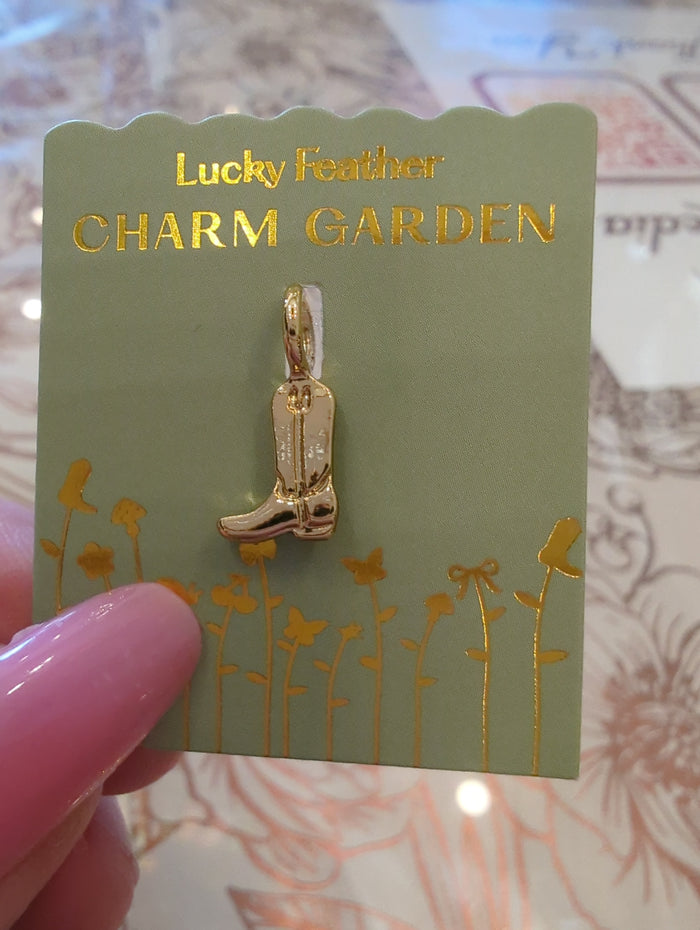 Gold cowboy boot charm from Lucky Feather's Charm Garden collection, featuring a detailed Western-style design.