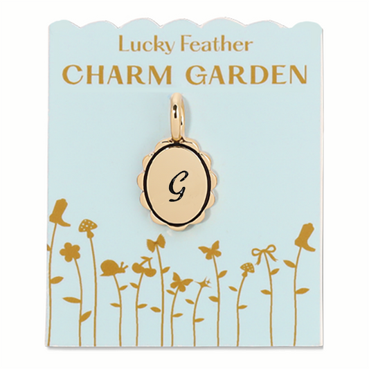 Gold scalloped initial charm with letter G from Lucky Feather Charm Garden collection, featuring intricate design and shiny finish.
