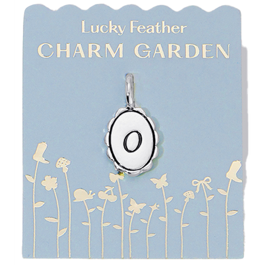 Silver scalloped initial charm with the letter O from Lucky Feather's Charm Garden collection, featuring intricate design details.