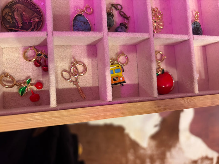 Joia Charming Charms collection featuring colorful, detailed charms for bracelets and jewelry accessories