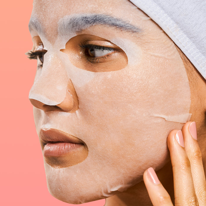 Model wearing a Rael face sheet mask.