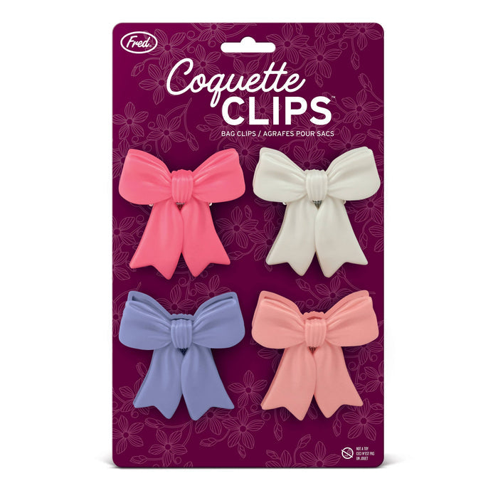 Fred & Friends Coquette Clips set of 4 bow-shaped chip clips with colorful, decorative plastic design for sealing snack bags.