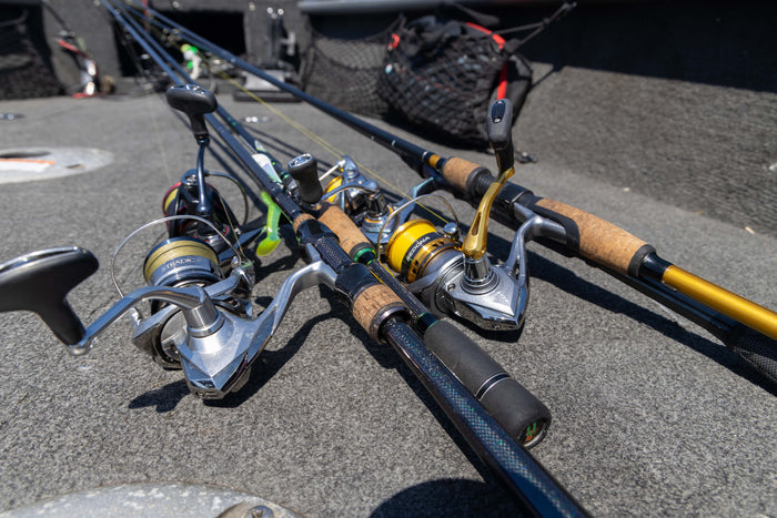 Bottom view of four fishing poles.