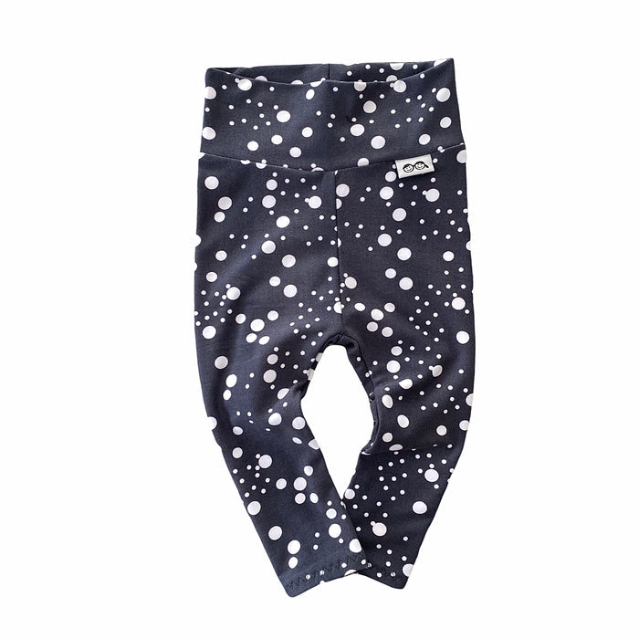 Handmade polka dot leggings for babies and toddlers, featuring a stylish black and white design. Soft, stretchy, and perfect for everyday wear, playtime, or special occasions. Designed for comfort and movement.