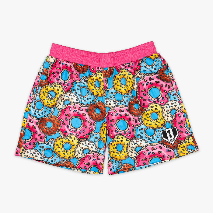 Youth model wearing multi-color Donut Assorted Flavors youth shorts