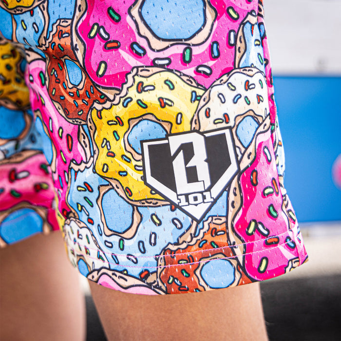 Youth model wearing multi-color Donut Assorted Flavors youth shorts