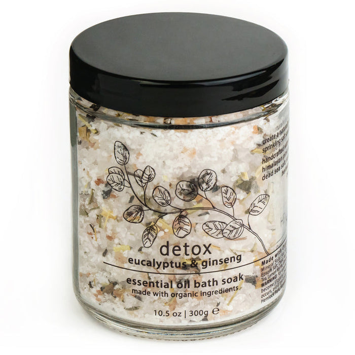 Detox bath soak jar with eucalyptus & ginseng label and bath crystals, black lid