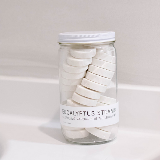 Jumbo shower vapor tablet jar with white round tablets and screw-top lid