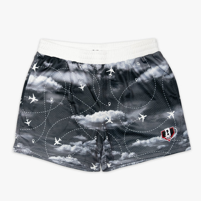 Youth model wearing gray Flight Map Red Eye youth shorts