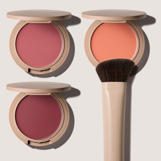 No Makeup Makeup – Three blush compacts with a brush on a light beige background, natural minimal makeup
