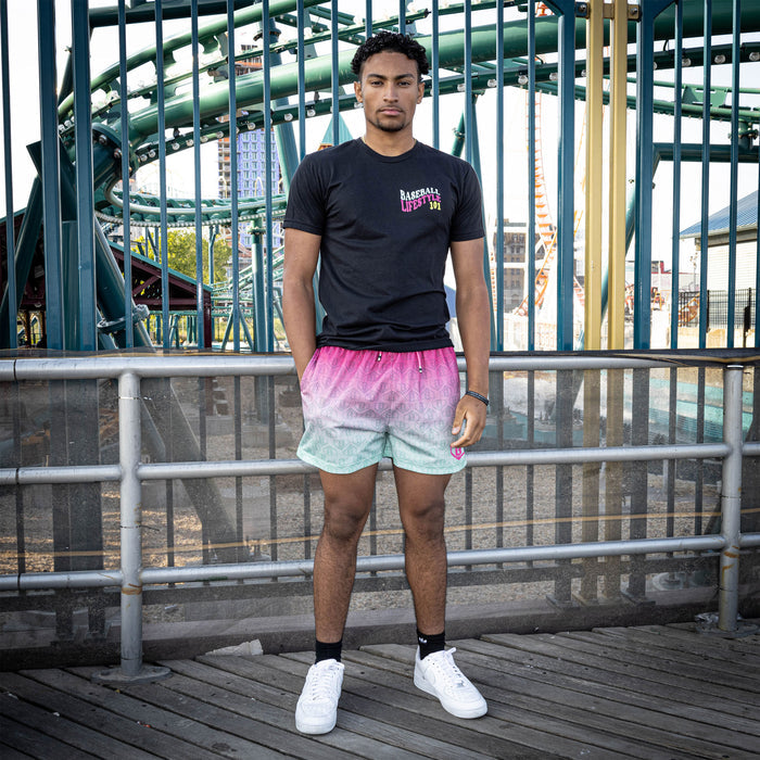 Adult model wearing multi-color Gradient Watermelon shorts