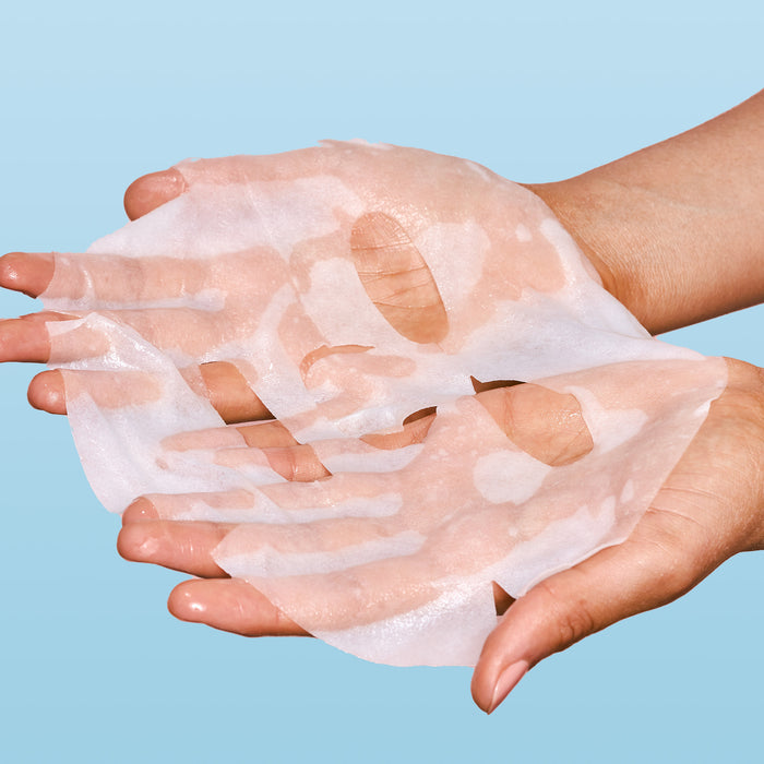 Rael face sheet mask in hands.