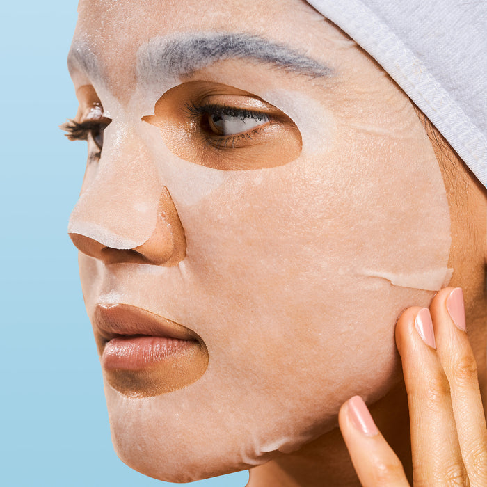 Model wearing a Rael face sheet mask