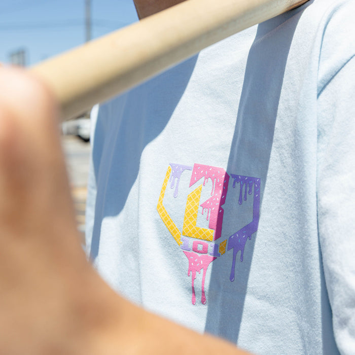 Adult model wearing blue Ice Cream Frosted graphic tee