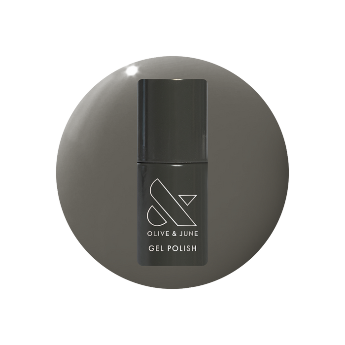 Is It Smoky In Here? Gel polish bottle with deep charcoal gray for a sleek, long-lasting mani by Olive and June