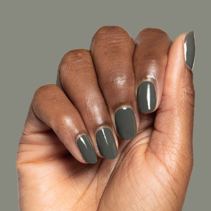Is It Smoky In Here? Gel polish in deep charcoal gray on natural medium-length nails for a smooth mani