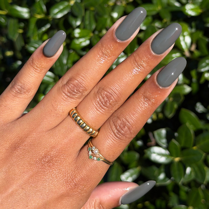 Is It Smoky In Here? Gel polish on medium-length nails in deep smoky gray for a smooth mani by Olive and June
