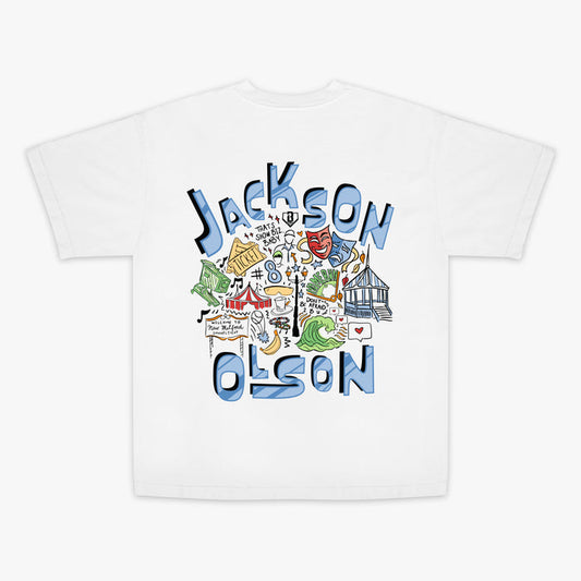White t-shirt with colorful graphic design and 'Jackson Olson' text on a white background