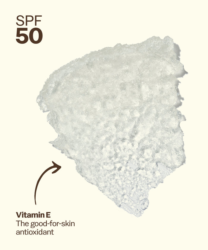 White powdery substance with SPF 50 text and vitamin E label on a light background