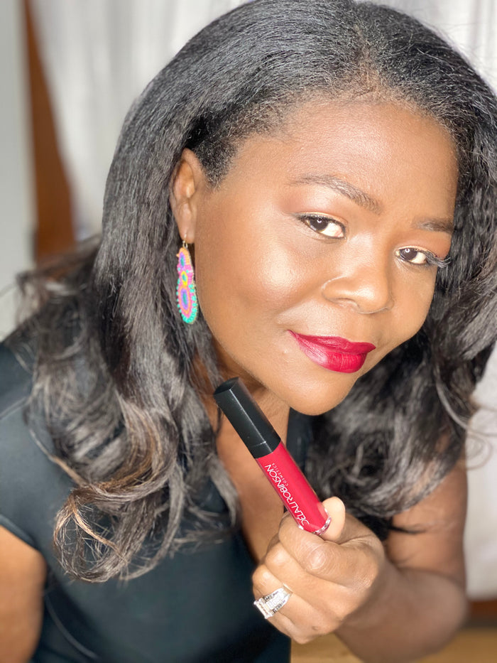customer wearing Kiss Me matte lipstick