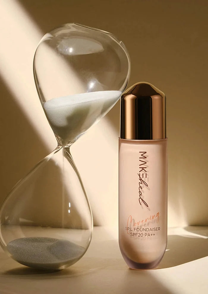 Makeup product with an hourglass on a beige background