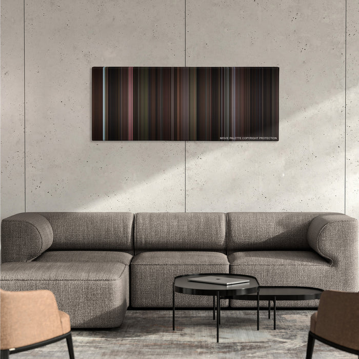 Miller's Crossing color palette canvas on a concrete wall above a gray sectional sofa