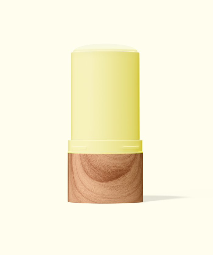 Sun Bum Original Face and Body Stick 40 in yellow and wood-textured packaging with cap off on a white background