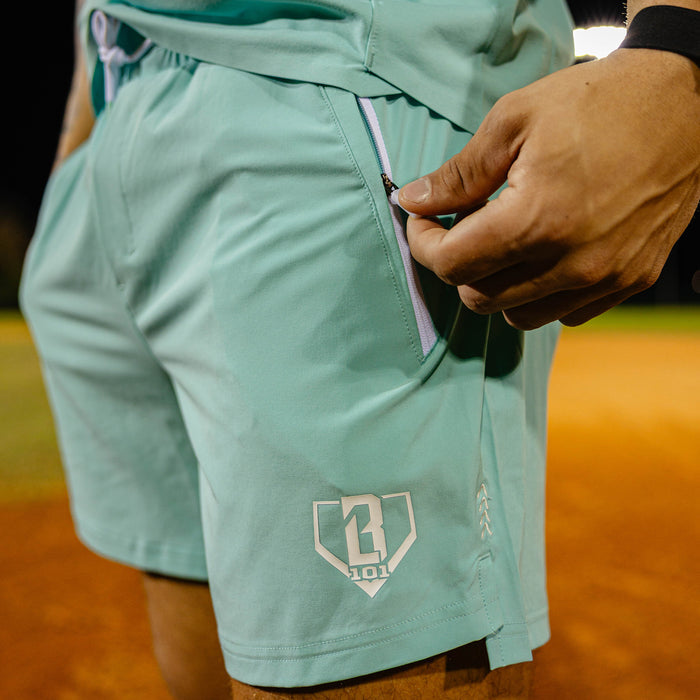 Adult model wearing blue Pro Series with Liner Teal shorts
