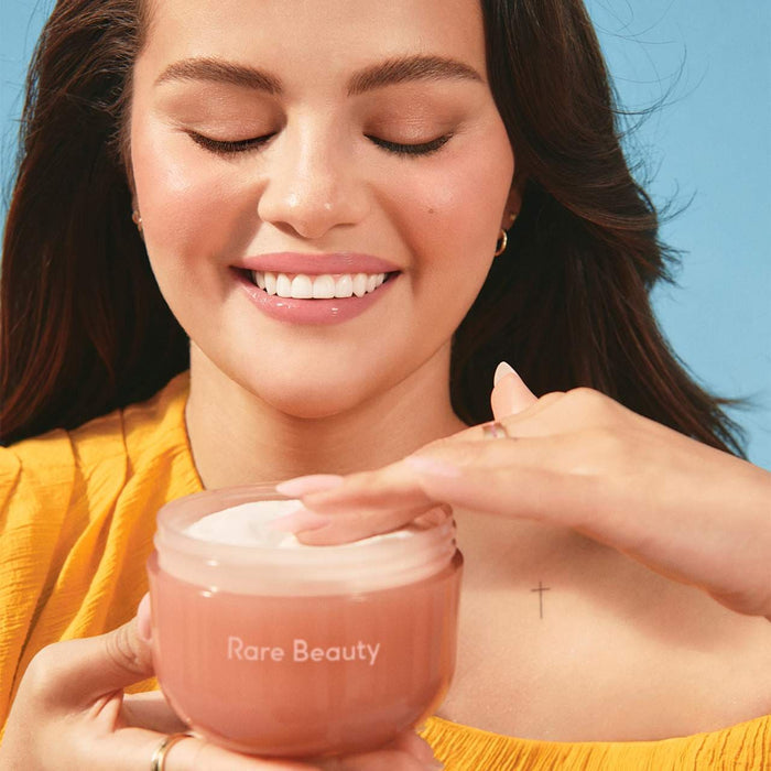 Rare Beauty Find Comfort Bouncy Body Cream with Hyaluronic Acid, shown in a sleek jar with a smooth, creamy texture.