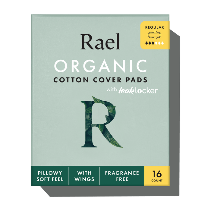 A package of Rael Organic Cotton Cover Pads in the Regular size, featuring a sage green box with dark green and yellow accents, on a white background with a soft shadow.