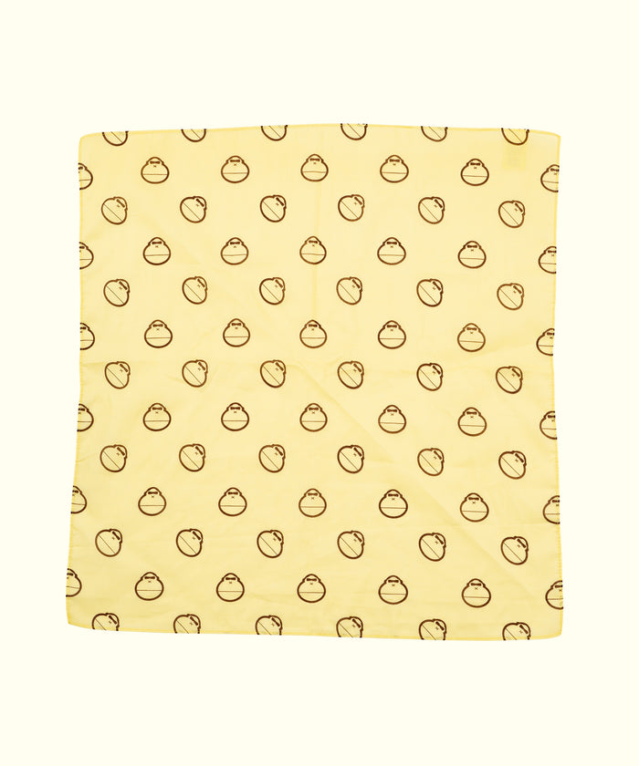 Light yellow Sonny Bandana featuring an all-over pattern of small, brown smiling suns, ideal for headbands, neck wraps, or even a handy cloth. Sun Bum,