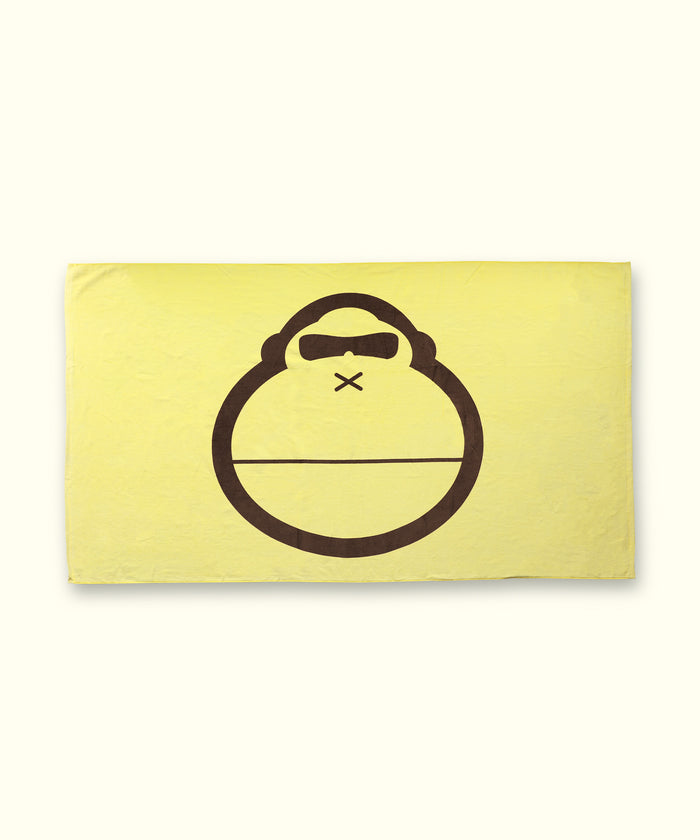 "Sonny" Beach Towel with large Sonny graphic on yellow background, perfect for sunny beach days. Sun Bum