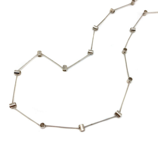 Sterling silver pivot necklace with bar links and small round accents, open chain