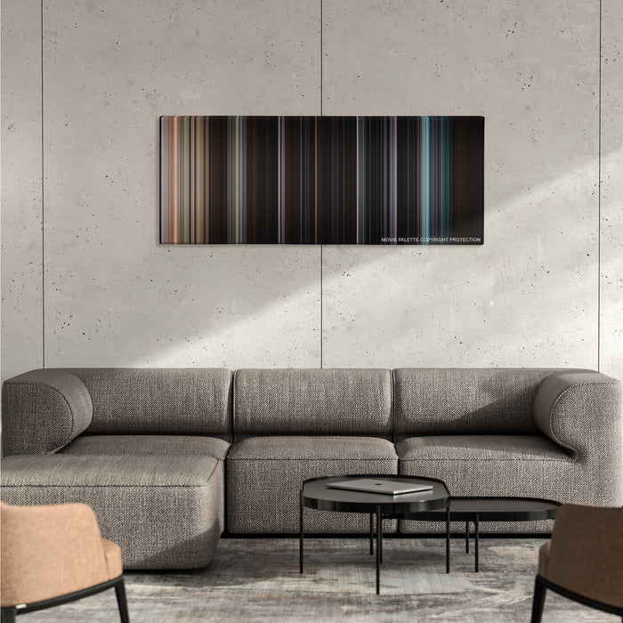 The Cabin in the Woods color palette canvas on a concrete wall above a gray sectional sofa