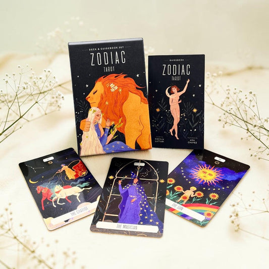 Zodiac tarot cards with colorful illustrations on a light background