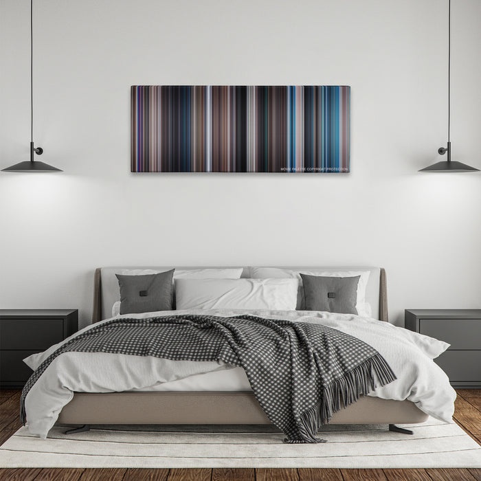 Thunderball color palette canvas above a bed, between two black pendant lamps