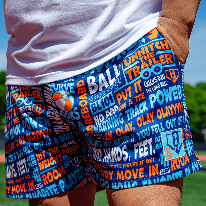 Adult model wearing navy shorts with "Trash Talk" design