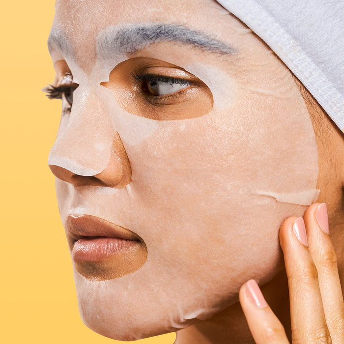 Model wearing a Rael face sheet mask.